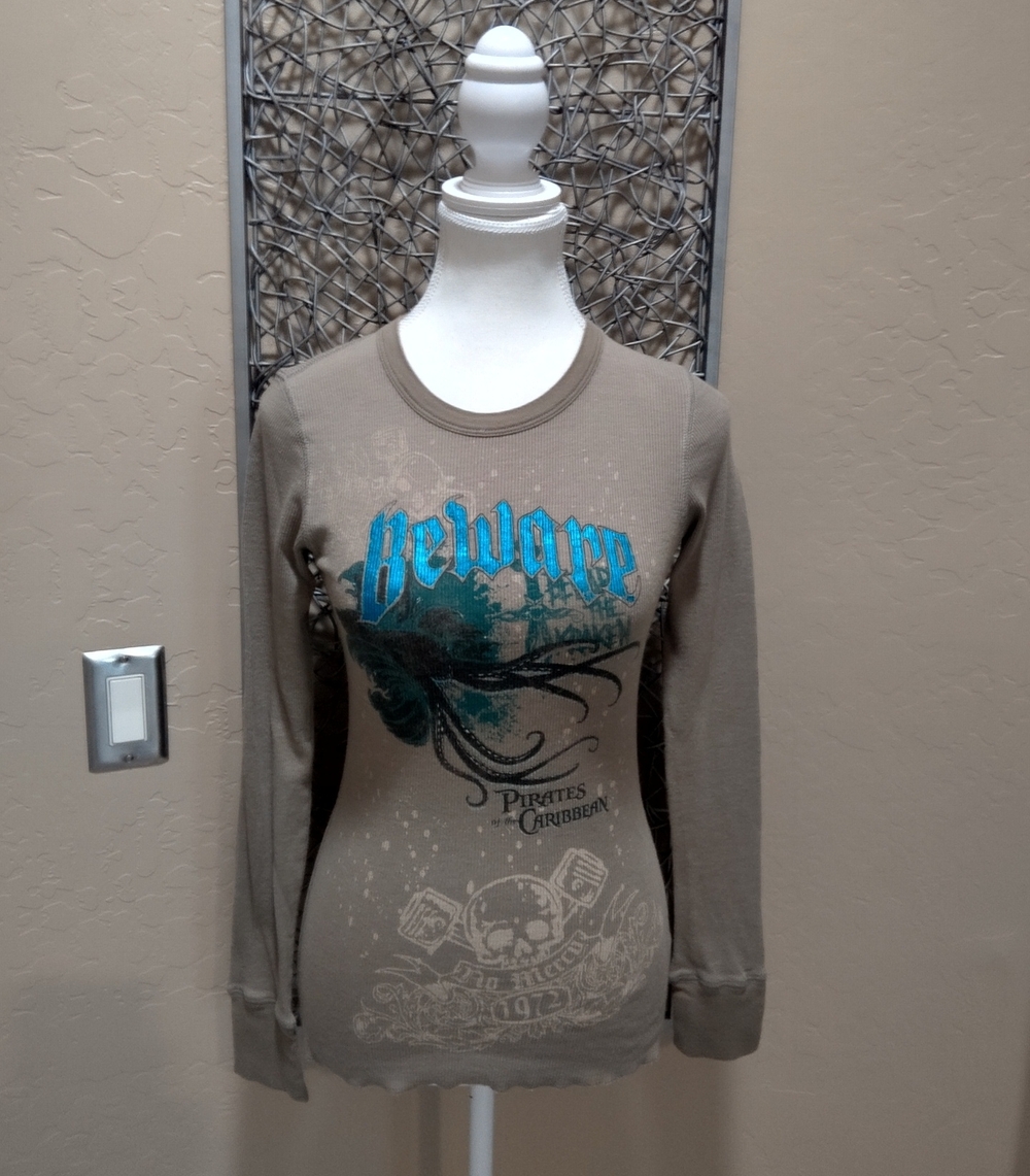 Pirates of the Caribbean Women's 'Beware' Long Sleeve Crewneck Olive Top